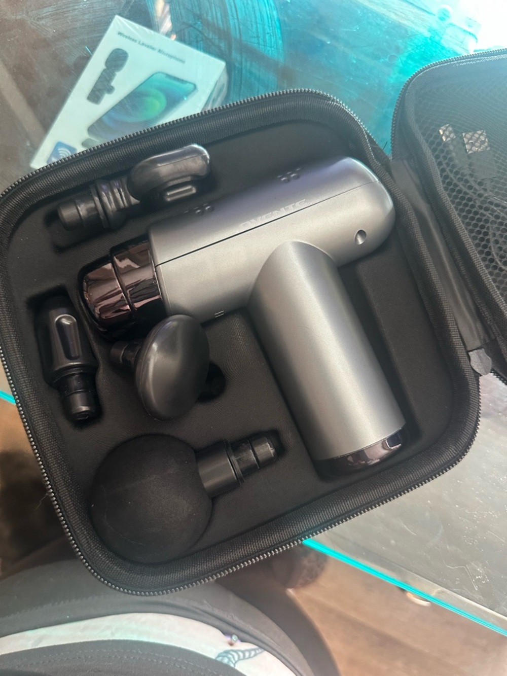 Portable Silver Massage Gun with Multiple Heads
